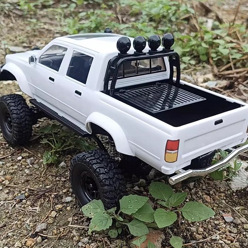 Радиоуправляемый внедорожник WPL (#SG-C-64-1-W) WPL Naughty Dragon Hilux 4WD 1:16
