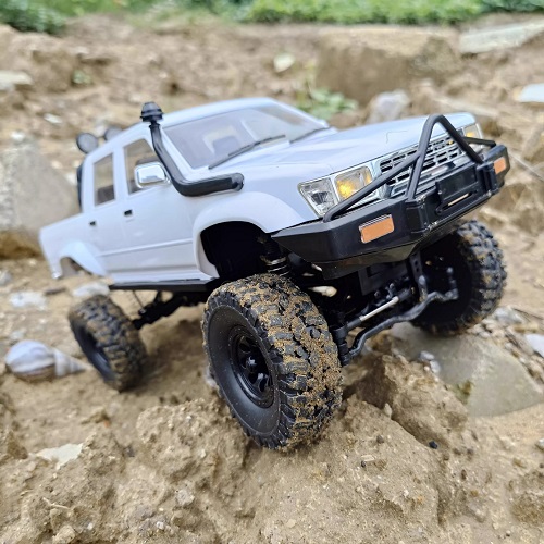 Радиоуправляемый внедорожник WPL (#SG-C-64-1-W) WPL Naughty Dragon Hilux 4WD 1:16